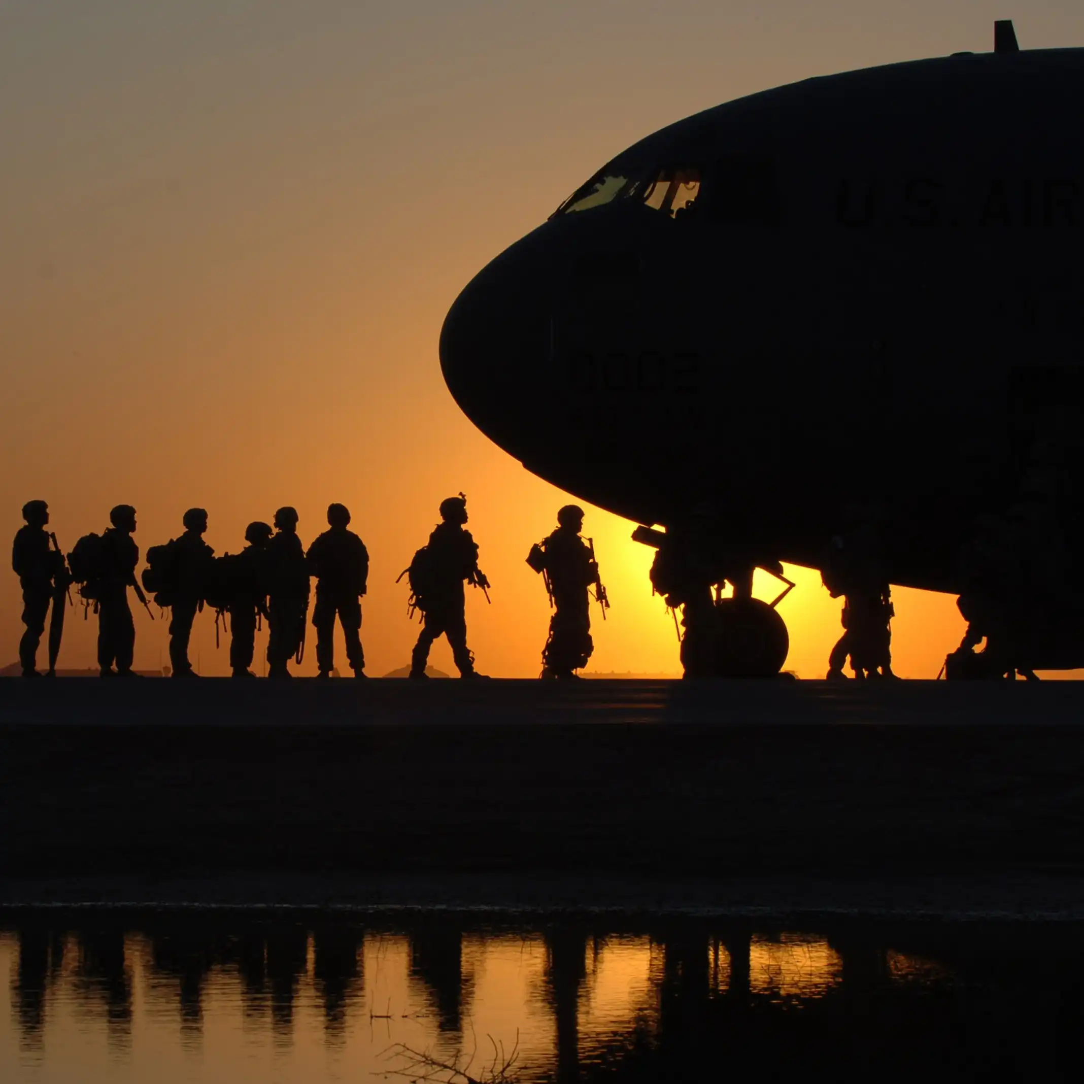 Soldiers in Line to Get in a Plane